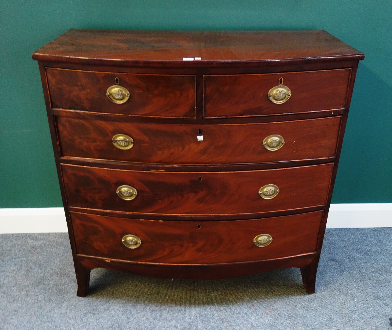 Appraisal: A Regency mahogany bowfront chest of two short and three