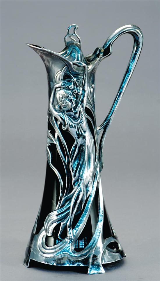 Appraisal: Art Nouveau style pitcher and pair cobalt-blue decanters floral-and-figural silver