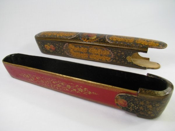 Appraisal: Persian black lacquered pen box ornately hand decorated with flowers