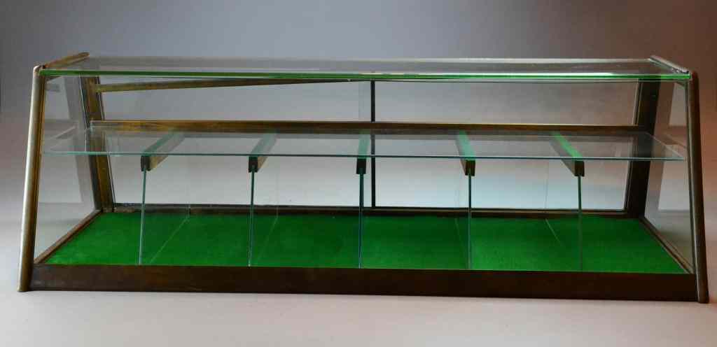 Appraisal: Contemporary Glass-Topped Display CabinetAdjustable shelves lighted glass top front two