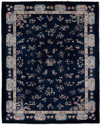 Appraisal: Chinese rug repeating floral bouquets and baskets on blue field