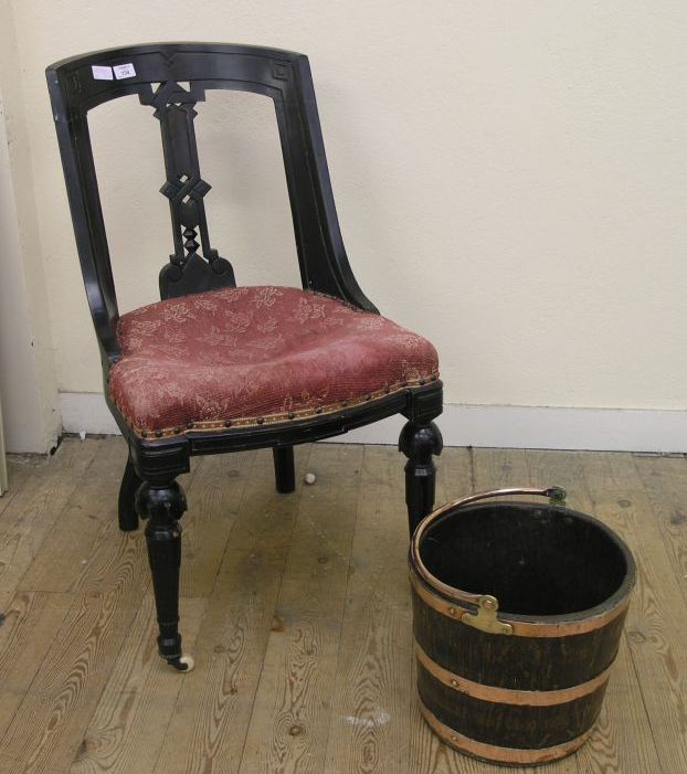 Appraisal: A late Victorian ebonised dining chair with upholstered seat together