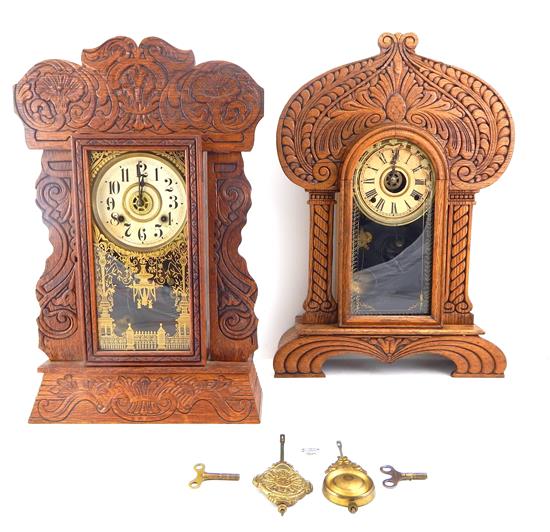 Appraisal: CLOCKS Two th C gingerbread mantle clocks oak the first