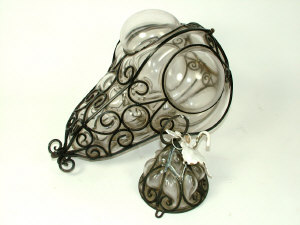 Appraisal: A two part blown glass and wrought iron ceiling lantern