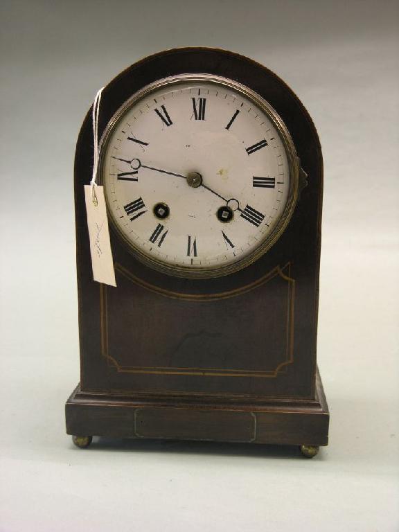 Appraisal: An Edwardian inlaid mahogany mantel clock with convex enamelled dial