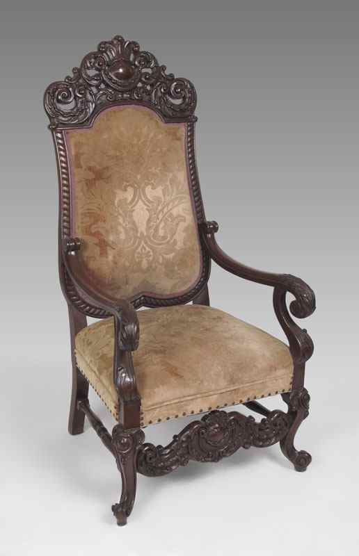 Appraisal: ITALIAN CARVED HIGH BACK CHAIR Heavily carved throne chair with