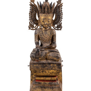 Appraisal: A Burmese Carved Wood Seated Buddha th th Century Height