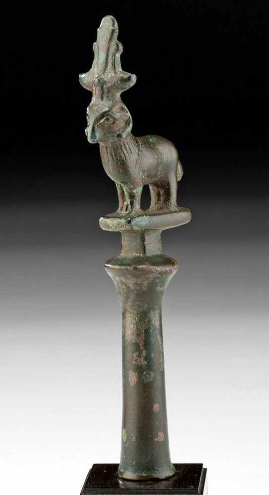 Appraisal: Egyptian Ptolemaic Bronze Staff Finial Ram Atop Egypt Ptolemaic Period