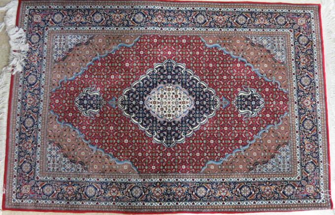 Appraisal: FINE PERSIAN AREA RUG very finely hand knotted in a