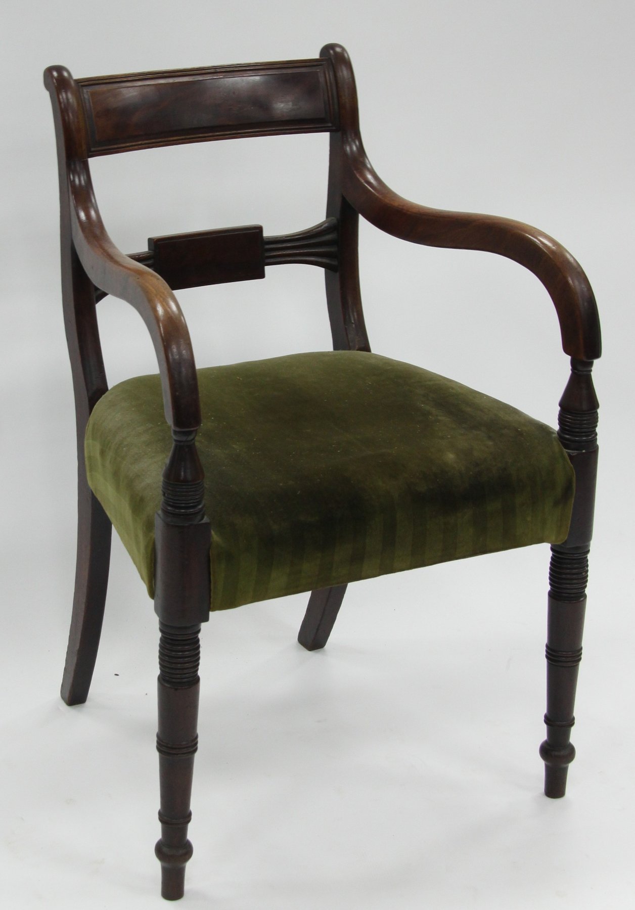 Appraisal: A Regency mahogany open armchair with bar backs the downswept