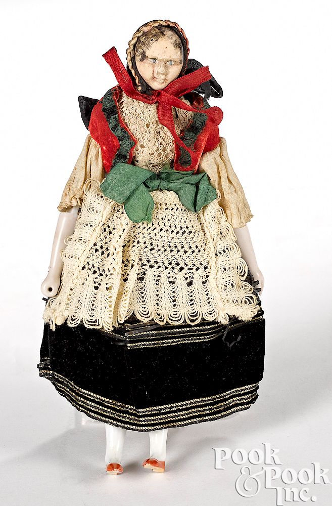 Appraisal: Peg wooden doll in German costume Peg wooden doll in