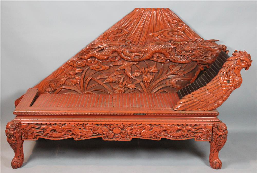 Appraisal: JAPANESE CARVED SCARLET LACQUER RECAMIER MEIJI PERIOD s elaborately carved