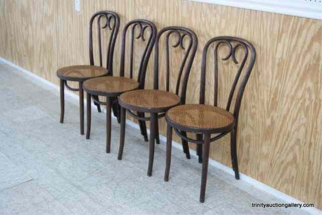 Appraisal: Set of Vintage Oak Bent Wood Cane Seat ChairsProduced c