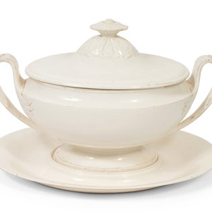 Appraisal: A French White Glazed Fa ence Tureen and Underplate th