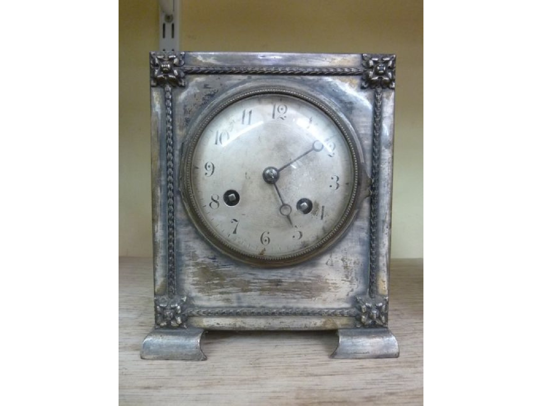 Appraisal: An Edwardian silver plated mantle clock the case with applied