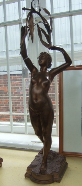 Appraisal: A French bronze model of a maiden circa after Jean