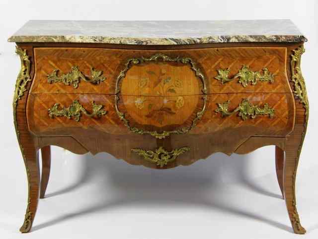 Appraisal: A pair of Louis XV style marble topped commodes circa