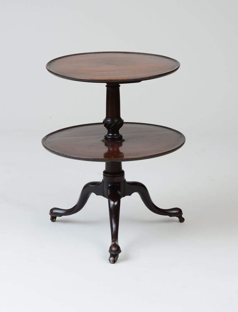 Appraisal: GEORGE II MAHOGANY TWO-TIER DUMBWAITER With two circular dished shelves