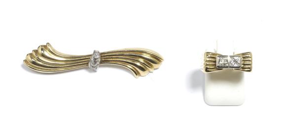 Appraisal: A GOLD AND DIAMOND RING and BROOCH circa Yellow gold