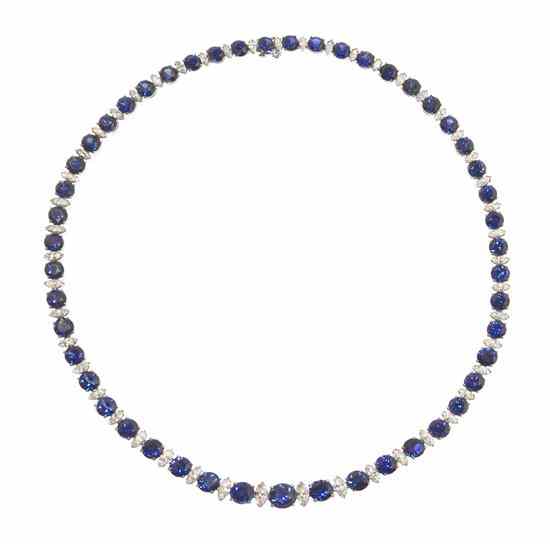 Appraisal: A Platinum Sapphire and Diamond Graduated Line Necklace containing one