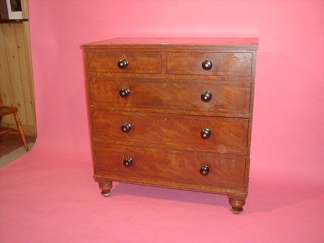 Appraisal: A Victorian grain painted pine five drawer chest with knob