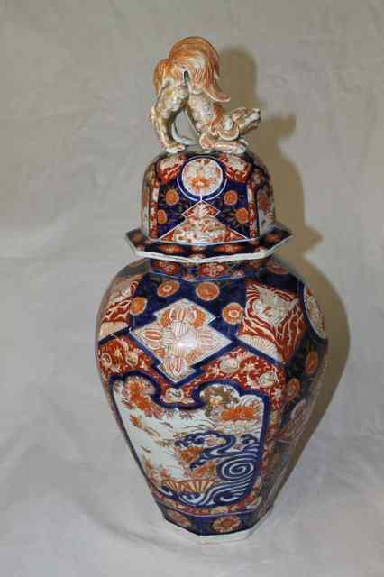 Appraisal: A JAPANESE IMARI OCTAGONAL VASE and cover with kylin finial