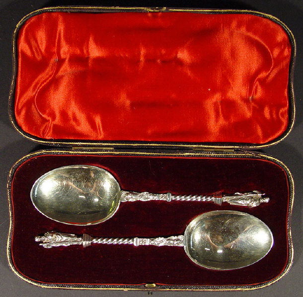 Appraisal: Pair of Victorian silver plated berry spoons with figural finials