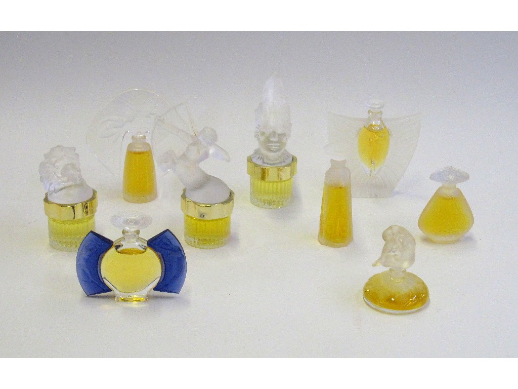 Appraisal: Nine modern Lalique miniature perfume bottles and contents