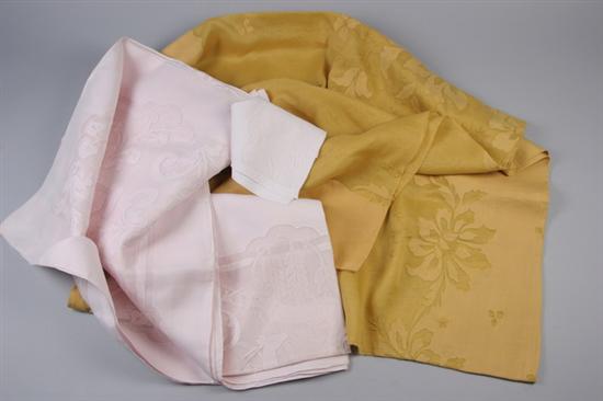 Appraisal: THREE COLORED COTTON CUT-WORK AND APPLIQUE TABLECLOTHS WITH NAPKINS One