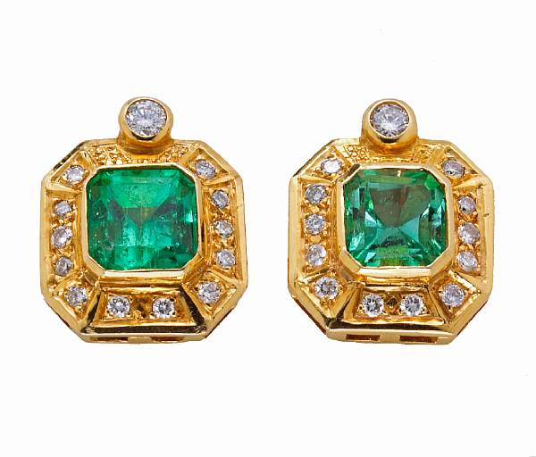 Appraisal: A pair of emerald and diamond clip-earrings mounted in fourteen