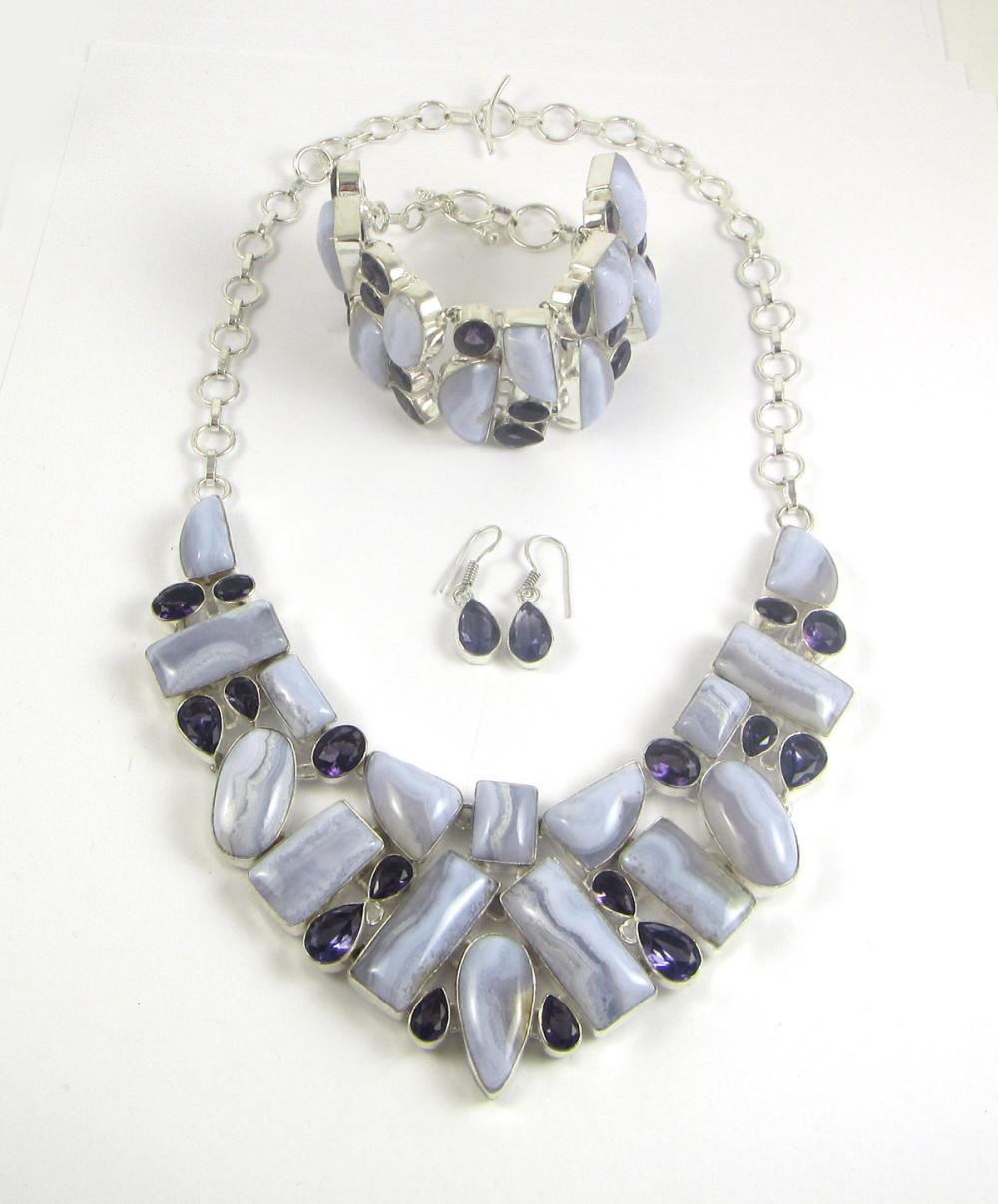 Appraisal: FOUR ARTICLES OF AMETHYST AND BLUE LACE AGATE JEWELRY including