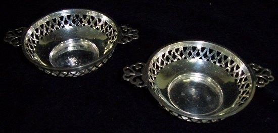 Appraisal: A pair of circular sweetmeat dishes with pierced borders and