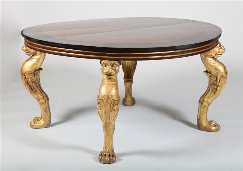 Appraisal: REGENCY STYLE EBONIZED ROSEWOOD AND PARCEL-GILT CENTER TABLE The circular