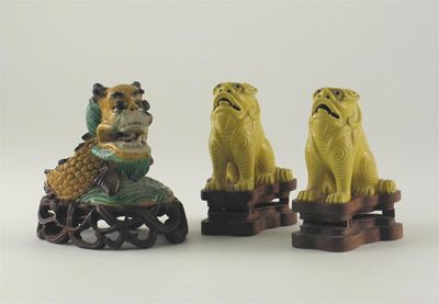 Appraisal: A Chinese enamel on biscuit model of a lion rising