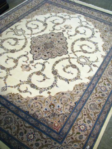 Appraisal: Tabriz style Oriental rug approximately x cream field with beige