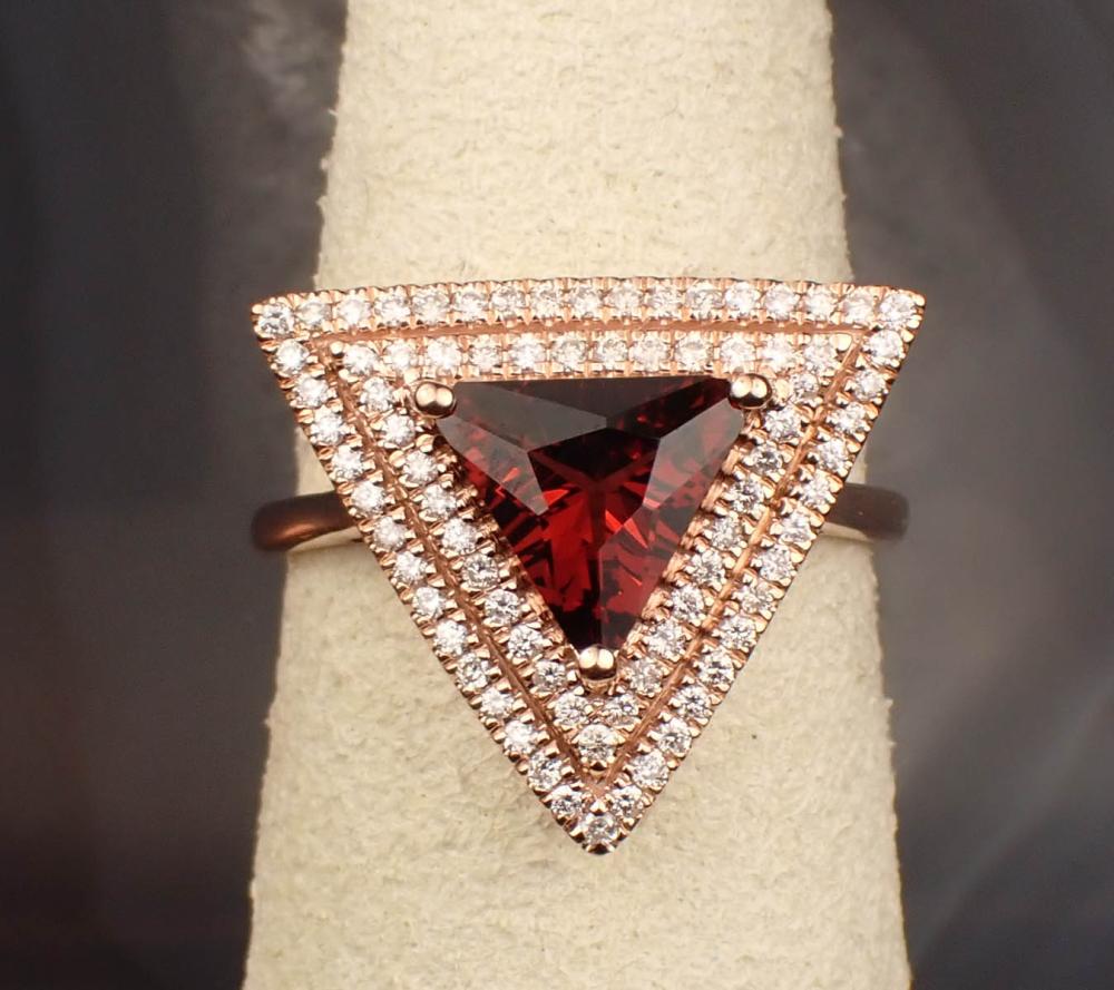 Appraisal: GARNET DIAMOND AND FOURTEEN KARAT GOLD RING The rose gold