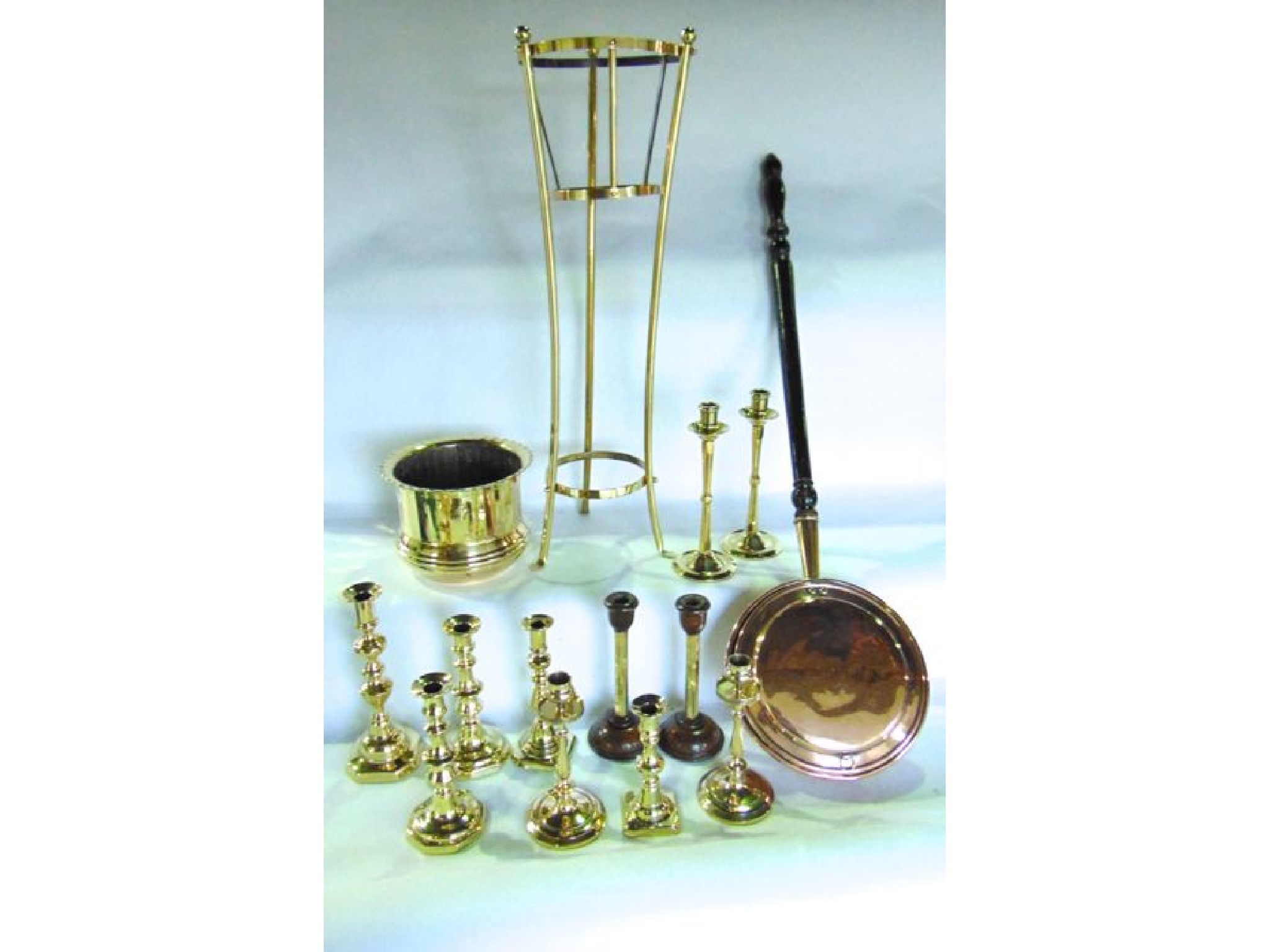 Appraisal: A brass jardini re stand with associated jardini re a