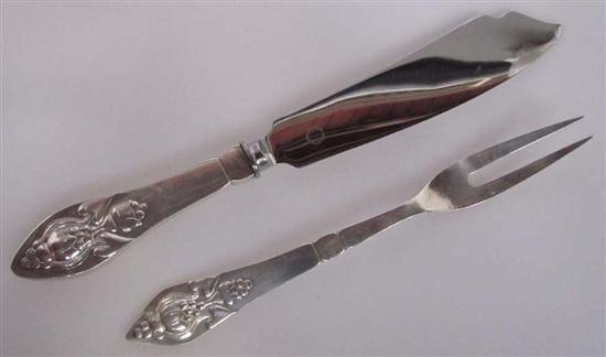 Appraisal: TWO GEORG JENSEN VINTAGE FUCHSIA SERVERS A cake knife with