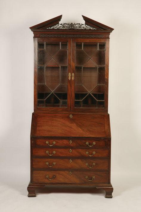 Appraisal: A GEORGE III MAHOGANY BUREAU BOOKCASE the upper section with