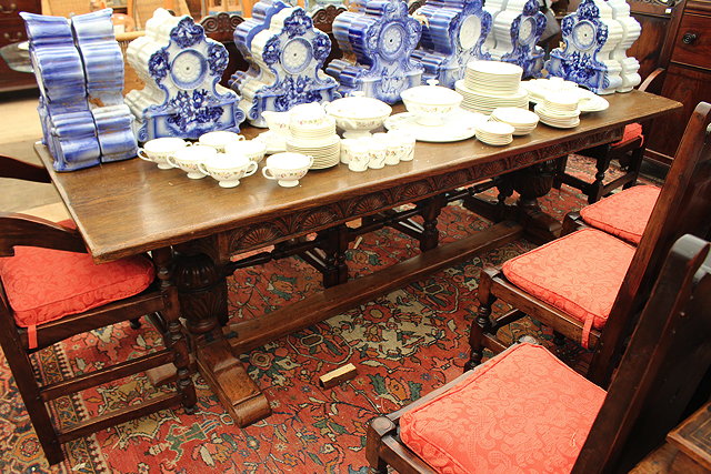 Appraisal: AN OAK REFECTORY TABLE the base with carved frieze cup