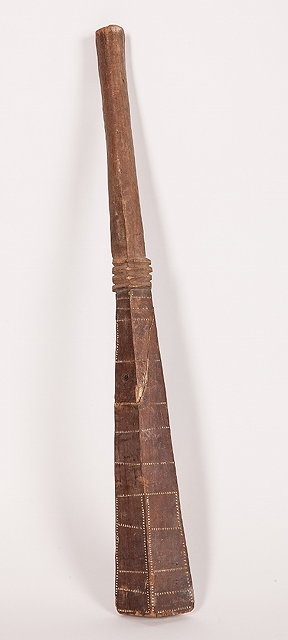 Appraisal: A SOLOMON ISLANDS CARVED WOODEN CLUB with tapering handle and