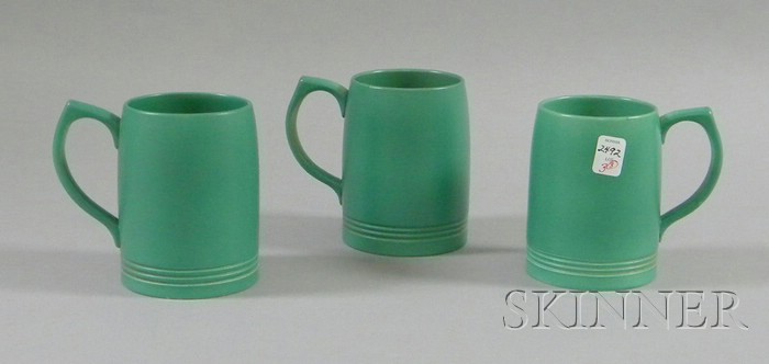 Appraisal: Three Wedgwood Keith Murray Designed Green Glazed Ceramic Mugs rim