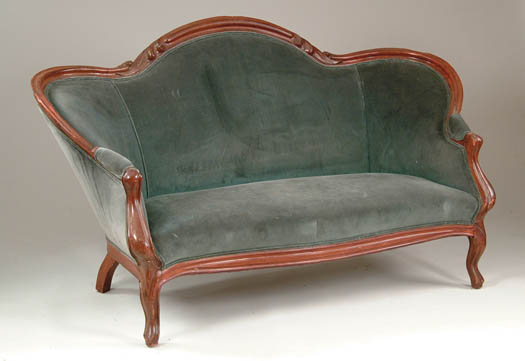 Appraisal: FINGER CARVED WALNUT SOFA Green upholstery with a finger carved