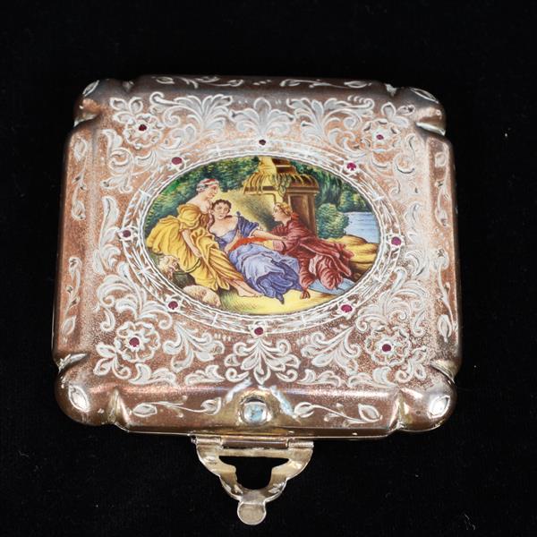 Appraisal: Italian bright-cut engraved and enameled silver compact with pink sapphires