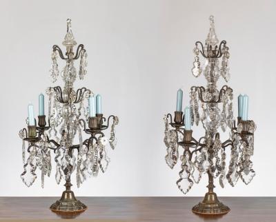 Appraisal: A pair of table candelabra with four candle sconces and