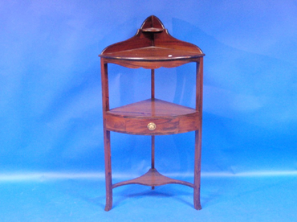 Appraisal: A Georgian-style mahogany two-tier corner washstand fitted with a drawer