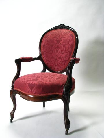 Appraisal: Victorian carved cameo back arm chair carved walnut frame with