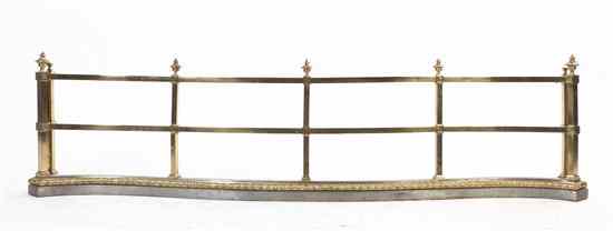 Appraisal: A Brass and Steel Fire Surround of serpentine form with