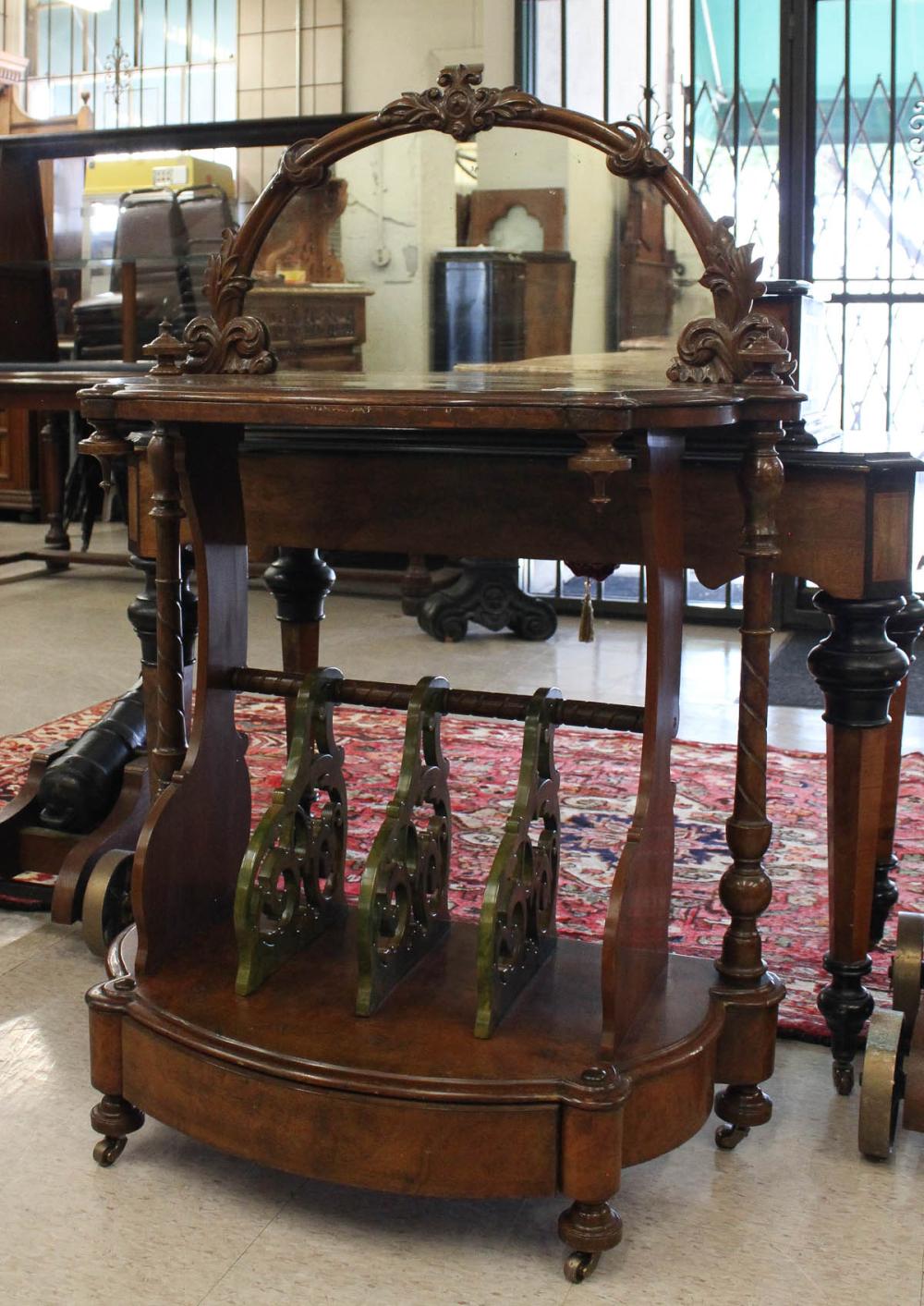 Appraisal: VICTORIAN CARVED WALNUT CANTERBURY TABLE English th century H x