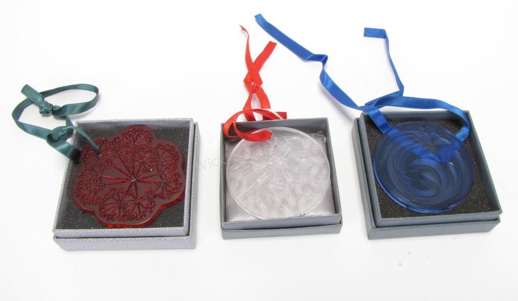 Appraisal: Three Lalique crystal ornaments a year round blue crystal ornament